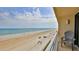 View of beach from condo balcony with seating at 2401 S Atlantic Ave # D306, New Smyrna Beach, FL 32169