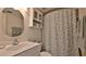 Cozy bathroom featuring vanity and enclosed shower at 2401 S Atlantic Ave # D306, New Smyrna Beach, FL 32169