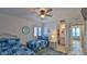 Bedroom with two twin beds, decorative wall art, and an en-suite bathroom at 2401 S Atlantic Ave # D306, New Smyrna Beach, FL 32169