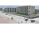 Stunning oceanfront condo building with pool and beach access steps away for luxury living at 2401 S Atlantic Ave # D306, New Smyrna Beach, FL 32169