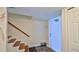 Hallway with stairs and closet, providing convenient access to storage and other areas of the home at 2401 S Atlantic Ave # D306, New Smyrna Beach, FL 32169