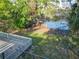 Backyard featuring lake access with boats, offering scenic views and outdoor activities at 278 Silverstone Dr, Orange City, FL 32763