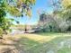 Backyard offering lakefront access with a small boat for recreation at 278 Silverstone Dr, Orange City, FL 32763
