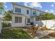 Spacious backyard with a patio featuring outdoor furniture, a well manicured lawn, and a privacy fence at 2827 Upper Park Road, Orlando, FL 32814