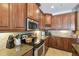 Classic kitchen with granite countertops and stainless steel appliances at 2827 Upper Park Road, Orlando, FL 32814