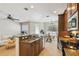 Bright, open kitchen with granite countertops and stainless steel appliances at 2827 Upper Park Road, Orlando, FL 32814