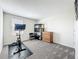 Multipurpose room with exercise equipment and storage space at 2861 Black Birch Dr, Ocoee, FL 34761