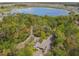 Aerial view of the community entrance, showcasing the lush landscaping and welcoming entry point at 2861 Black Birch Dr, Ocoee, FL 34761