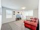 Cozy living room area with natural light, comfortable seating, and modern decor at 2861 Black Birch Dr, Ocoee, FL 34761