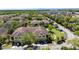 Aerial view of a meticulously planned community with townhouses and lush green spaces at 2898 Oakwater Dr # 2898, Kissimmee, FL 34747