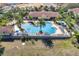 Aerial view of community pool, clubhouse, and recreation area at 2898 Oakwater Dr # 2898, Kissimmee, FL 34747