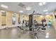 A well-equipped fitness center features treadmills, weights, and ample mirrors for a complete workout experience at 2898 Oakwater Dr # 2898, Kissimmee, FL 34747