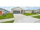 Lovely one-story home featuring a two-car garage, set in a peaceful residential neighborhood with sidewalk at 33332 Seattle Slew Dr, Sorrento, FL 32776
