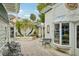 Enchanting courtyard with water fountain, outdoor seating and shops, creating a relaxing shopping experience at 33436 Seattle Slew Dr, Sorrento, FL 32776
