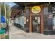 Las Palmas Cuban Restaurant featuring outdoor seating and vibrant signage at 33436 Seattle Slew Dr, Sorrento, FL 32776