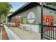 Exterior shot of The Salted Fry eatery with outdoor seating and a modern, inviting atmosphere at 33436 Seattle Slew Dr, Sorrento, FL 32776