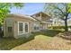 Two-story house with a well-maintained lawn and a covered patio at 3344 Quailwest Ct, Orlando, FL 32812