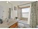 Cozy bathroom with bathtub-shower combination and decorative tile accents at 3344 Quailwest Ct, Orlando, FL 32812