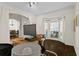 Bright living room featuring hardwood flooring and an expansive bay window at 3344 Quailwest Ct, Orlando, FL 32812