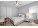 Cozy bedroom with a ceiling fan, a desk, a chair and a twin bed at 3375 Hanging Tide St, Winter Garden, FL 34787