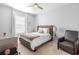 Bedroom with a ceiling fan, a twin bed with neutral colored linens and a padded headboard at 3375 Hanging Tide St, Winter Garden, FL 34787