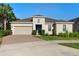 Charming one-story home with a brick driveway, well-maintained landscaping, and a two-car garage at 3375 Hanging Tide St, Winter Garden, FL 34787