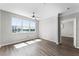 Bright bedroom with large windows and hardwood floors at 3384 Corona Village Way # 202, Orlando, FL 32835