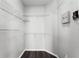 Walk-in closet features wire shelving and wood-look floors at 3384 Corona Village Way # 202, Orlando, FL 32835