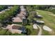 Golf course community with beautiful homes, mature trees, and a tranquil pond with a walking path at 3400 Park Grove Ct, Longwood, FL 32779