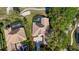 Lovely single-story home bordering the golf course with a screened-in pool and mature landscaping at 3400 Park Grove Ct, Longwood, FL 32779