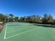 Community basketball and tennis courts offering recreational opportunities in a scenic, green setting at 437 Wilmington Cir, Oviedo, FL 32765