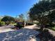 Community entrance featuring brick pillars, attractive landscaping, and paved walkway leading into Remington Park at 437 Wilmington Cir, Oviedo, FL 32765