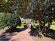 Inviting footbridge surrounded by mature trees and landscaping, perfect for leisurely strolls at 437 Wilmington Cir, Oviedo, FL 32765