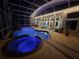 Stunning screened-in pool area with a hot tub, perfect for evening relaxation and outdoor enjoyment at 437 Wilmington Cir, Oviedo, FL 32765