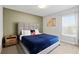 Comfortable bedroom featuring a plush bed, soft lighting, and a serene ambiance at 4445 Le Reve Ct, Kissimmee, FL 34746