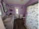 Charming bathroom with updated vanity, fixtures, and a unique, colorful design at 4798 Windwood Dr, Kissimmee, FL 34746