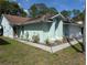 This home boasts a well-manicured lawn and beautiful curb appeal at 4798 Windwood Dr, Kissimmee, FL 34746