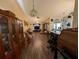 Bright and spacious living room featuring wood floors and plenty of natural light at 4798 Windwood Dr, Kissimmee, FL 34746