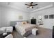 Comfortable bedroom featuring a ceiling fan, and a calming color scheme at 4911 Shady Pines Dr, St Cloud, FL 34772