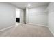 Walk-in closet with wire shelving, carpet, and neutral walls at 5251 Meredrew Ln, St Cloud, FL 34771