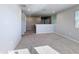 Neutral-toned loft with carpet, recessed lighting, and natural light from the window at 5251 Meredrew Ln, St Cloud, FL 34771