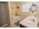 Bathroom with a tub-shower combo, dual vanity with sinks, and a neutral color scheme at 543 Flower Fields Ln, Orlando, FL 32824