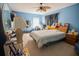 Comfortable bedroom with carpet, a window, and a ceiling fan, showcasing an inviting space at 543 Flower Fields Ln, Orlando, FL 32824