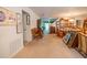 Hallway with decor on wall leading to another room at 543 Flower Fields Ln, Orlando, FL 32824