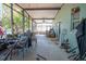 Screened patio with ceiling fan at 543 Flower Fields Ln, Orlando, FL 32824