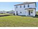 Expansive backyard featuring lush green grass, ideal for outdoor activities at 5717 Haystack Dr, St Cloud, FL 34771