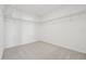 Walk-in closet with carpet floors and wire shelving, maximizing storage space at 5717 Haystack Dr, St Cloud, FL 34771