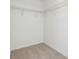 Walk-in closet with carpet floors and wire shelving, maximizing storage space at 5717 Haystack Dr, St Cloud, FL 34771