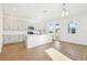 Beautiful kitchen boasting modern appliances, a stylish island, and sun-filled windows at 5717 Haystack Dr, St Cloud, FL 34771