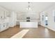 Spacious kitchen featuring stainless appliances, a kitchen island, and gray cabinets at 5717 Haystack Dr, St Cloud, FL 34771